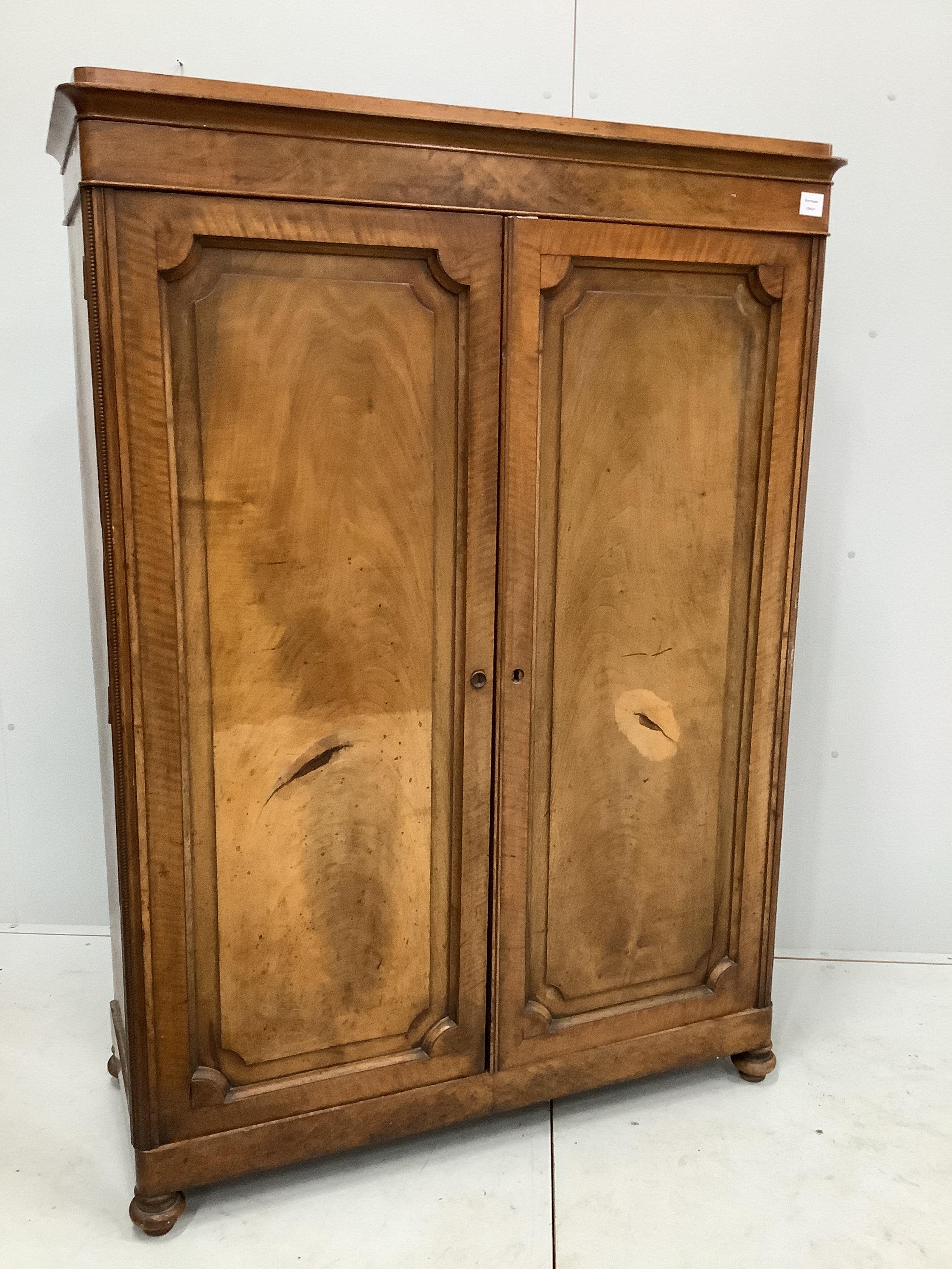 A 19th century French mahogany press cupboard, width 112cm, depth 46cm, height 158cm